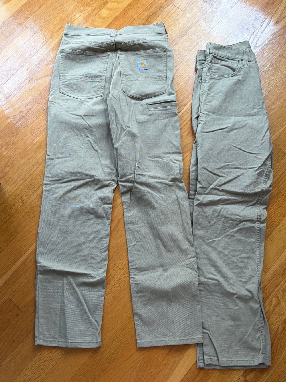 2 pair Carhartt pants 28x32